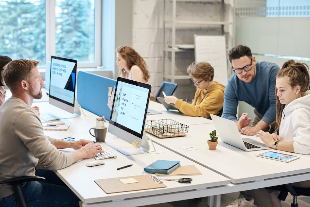 people at the office working at the a desk 