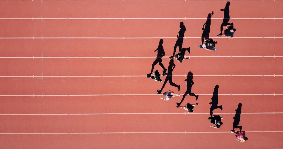 girls running on a court